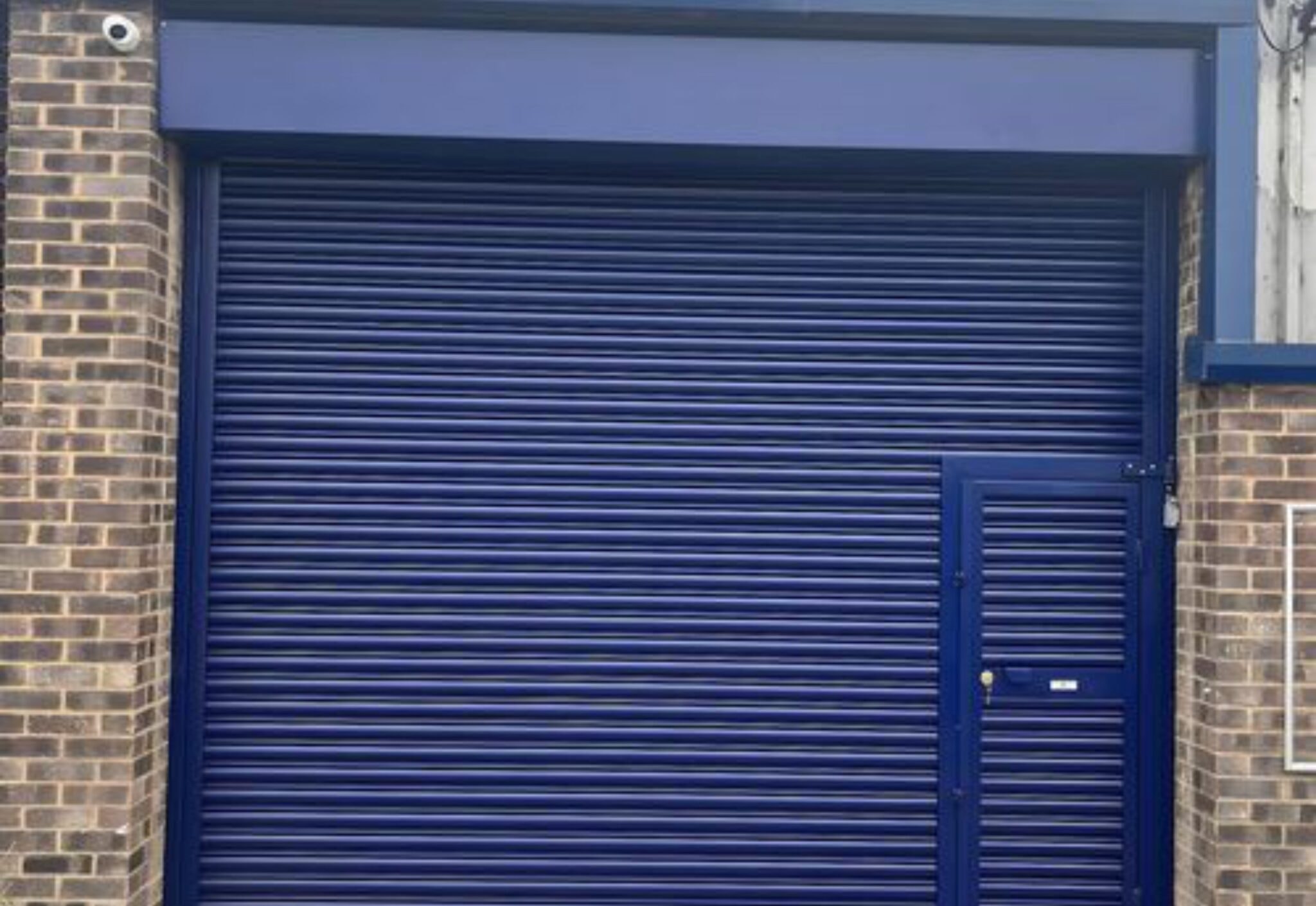 Warehouse Steel Shutter With Door